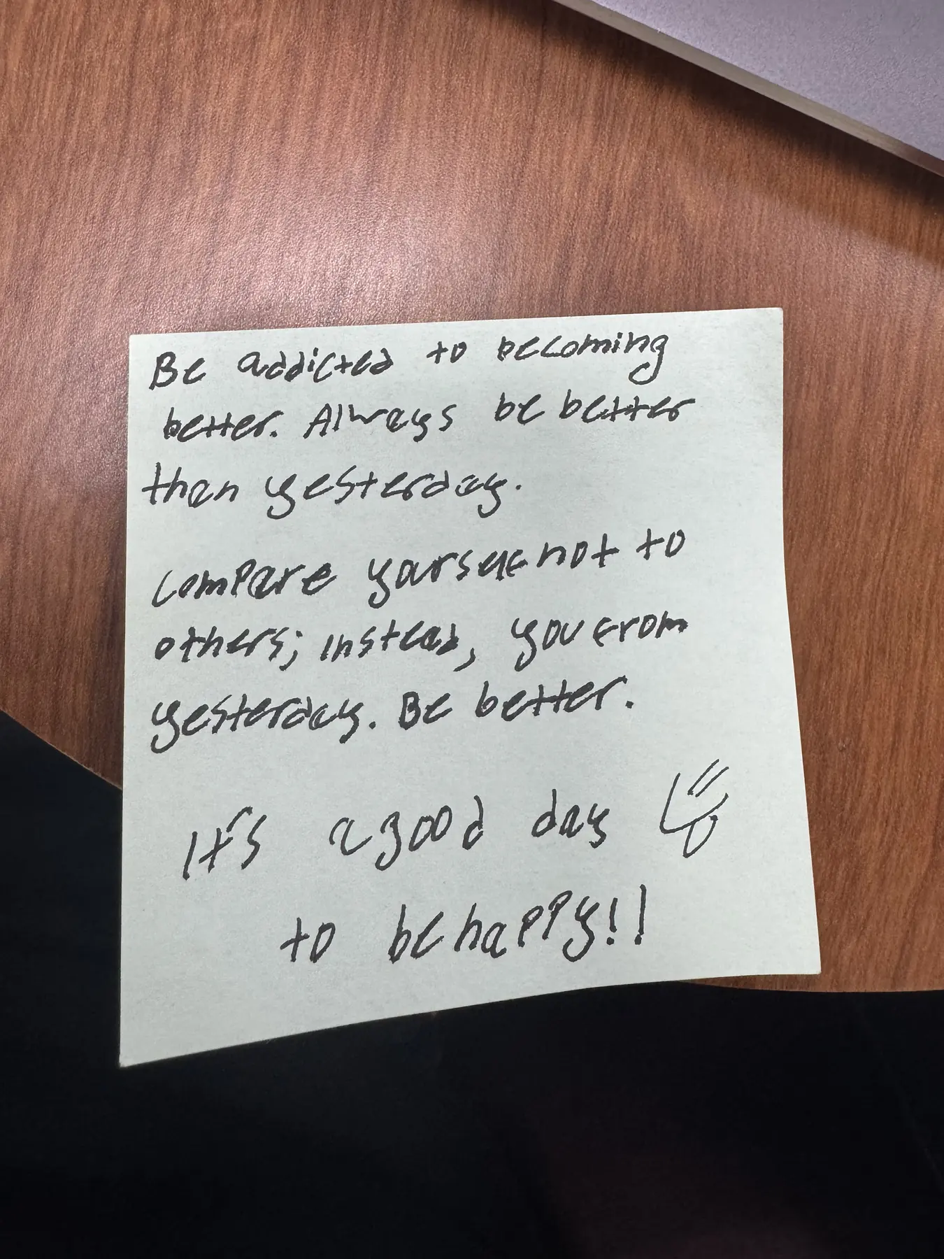 Handwritten sticky note with words of encouragement